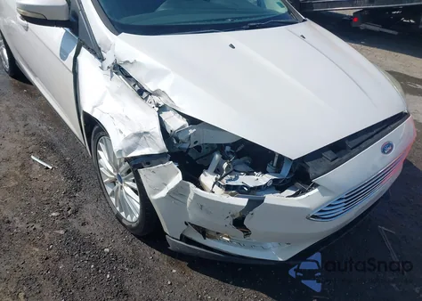 2015 Ford Focus Titanium from USA, damaged, VIN 1FADP3N29FL366447